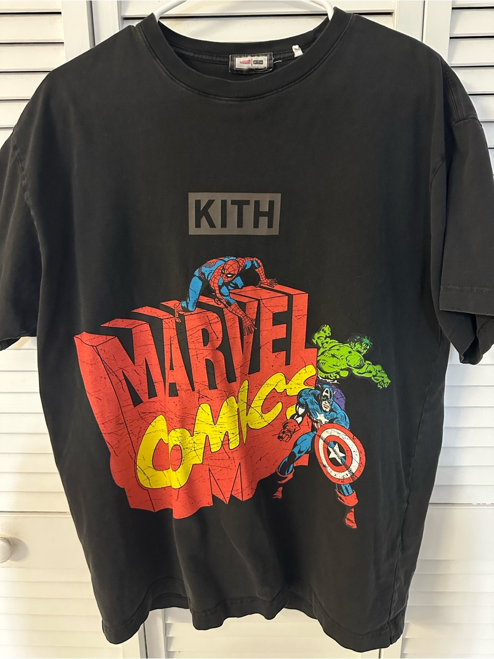 Kith Black Tee with Red Marvel Tag